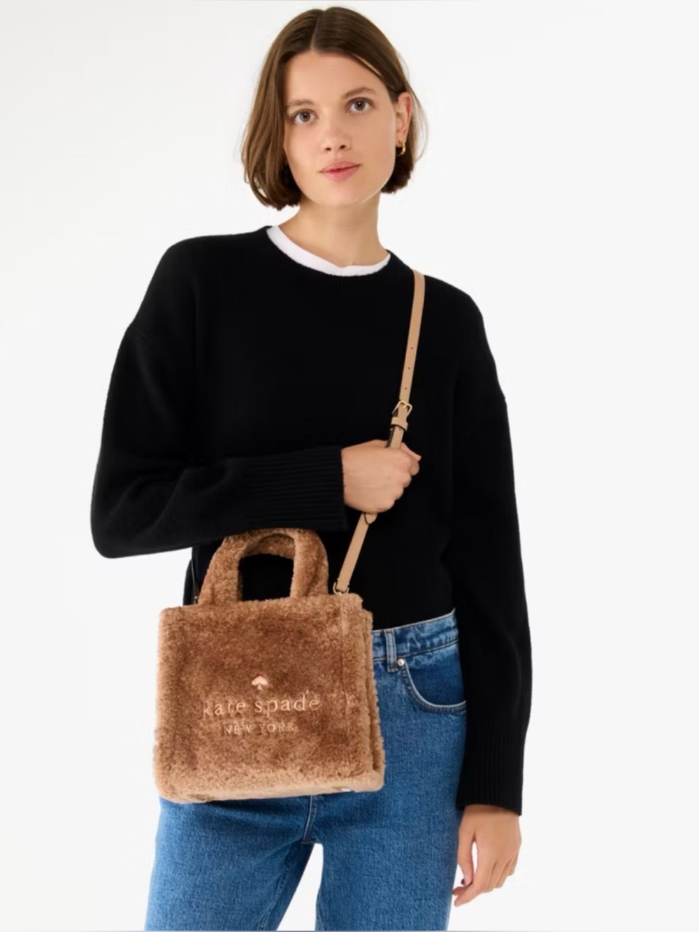 Kate Spade Ellie faux fur small tote features a soft, plush exterior